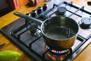 A Pot of Boiling Water on The Stove