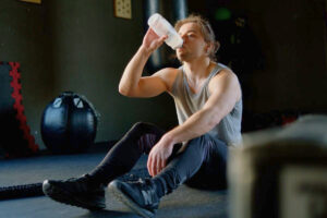 Man Drinking Water During Exercise